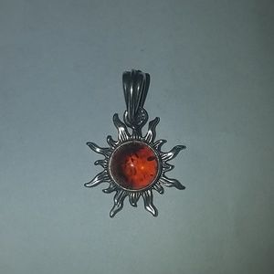 Amber sun silver pendant